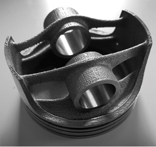 HardMarque used topology optimization to design a new lightweight piston head that was produced with titanium additive manufacturing. This aftermarket piston weighs 23.5% less than the original stock piston. Photo courtesy of HardMarque